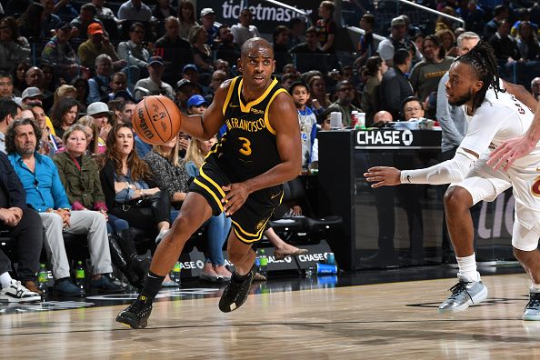 SAN FRANCISCO, CA - NOVEMBER 11: Chris Paul #3 of the Golden State Warriors dribbles the ball during the game against the Cleveland Cavaliers on November 11, 2023 at Chase Center in San Francisco, California. NOTE TO USER: User expressly acknowledges and agrees that, by downloading and or using this photograph, user is consenting to the terms and conditions of Getty Images License Agreement. Mandatory Copyright Notice: Copyright 2023 NBAE (Photo by Noah Graham/NBAE via Getty Images)