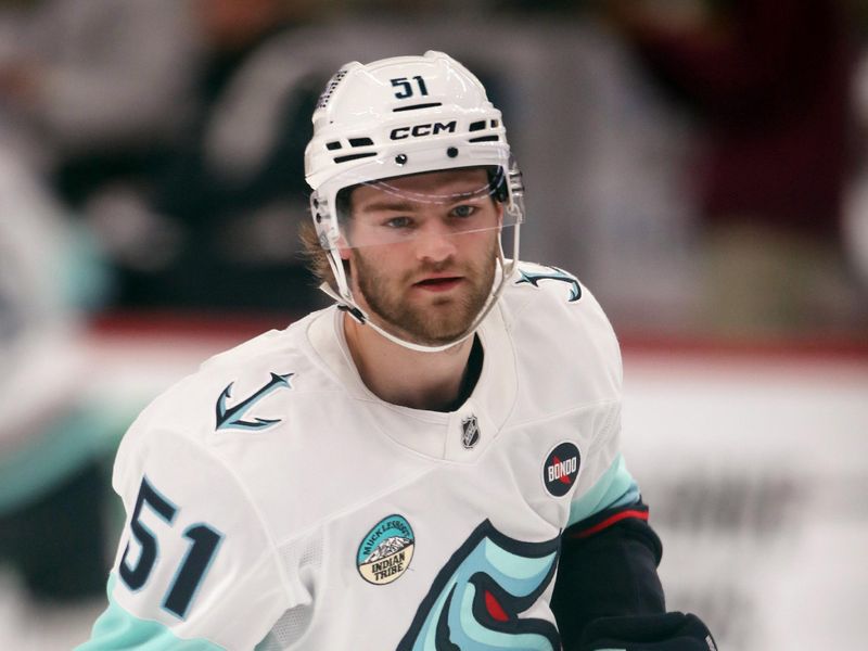 Jan 14, 2025; Pittsburgh, Pennsylvania, USA;  Seattle Kraken center Shane Wright (51) warms up before a game against the Pittsburgh Penguins at PPG Paints Arena. Mandatory Credit: Charles LeClaire-Imagn Images