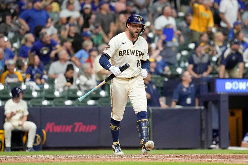 Jun 24, 2024; Milwaukee, Wisconsin, USA;  Milwaukee Brewers first baseman Rhys Hoskins (12) reacts after hitting a grand slam home run during the sixth inning against the Texas Rangers at American Family Field. Mandatory Credit: Jeff Hanisch-USA TODAY Sports