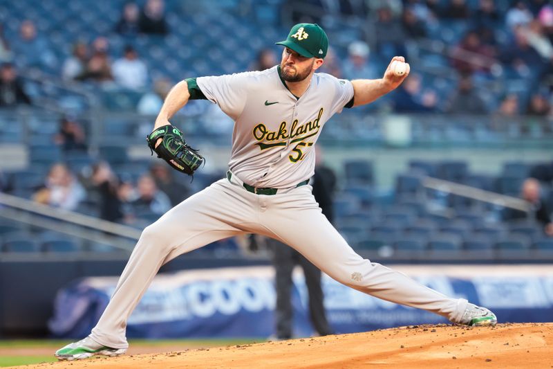 Apr 25, 2024; Bronx, New York, USA; Oakland Athletics starting pitcher Alex Wood (57) delivers a pitch during the first inning against the New York Yankees at Yankee Stadium. Mandatory Credit: Vincent Carchietta-USA TODAY Sports