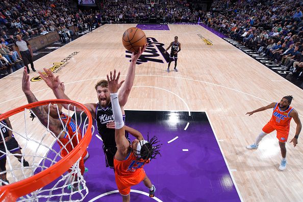 SACRAMENTO, CA - DECEMBER 14: Domantas Sabonis #10 of the Sacramento Kings shoots the ball during the game against the Oklahoma City Thunder on December 14, 2023 at Golden 1 Center in Sacramento, California. NOTE TO USER: User expressly acknowledges and agrees that, by downloading and or using this Photograph, user is consenting to the terms and conditions of the Getty Images License Agreement. Mandatory Copyright Notice: Copyright 2023 NBAE (Photo by Rocky Widner/NBAE via Getty Images)