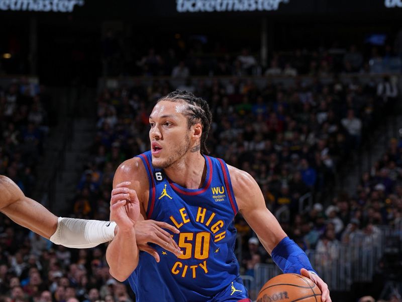 DENVER, CO - MARCH 25: Aaron Gordon #50 of the Denver Nuggets dribbles the ball during the game against the Milwaukee Bucks on March 25, 2023 at the Ball Arena in Denver, Colorado. NOTE TO USER: User expressly acknowledges and agrees that, by downloading and/or using this Photograph, user is consenting to the terms and conditions of the Getty Images License Agreement. Mandatory Copyright Notice: Copyright 2023 NBAE (Photo by Garrett Ellwood/NBAE via Getty Images)