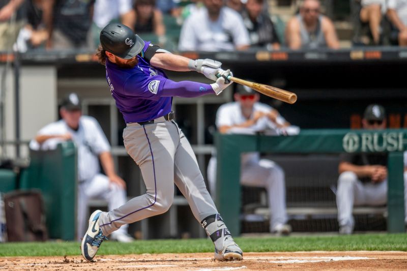 Jun 29, 2024; Chicago, Illinois, USA; Colorado Rockies second base Brendan Rodgers (7) hits a home run during the second inning against the Chicago White Sox at Guaranteed Rate Field. Mandatory Credit: Patrick Gorski-USA TODAY Sports