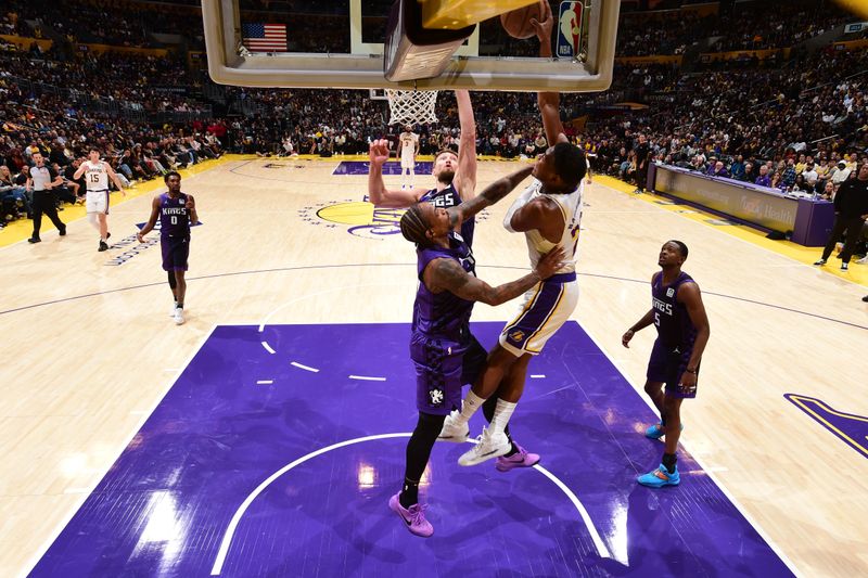 LOS ANGELES, CA - OCTOBER 26: Austin Reaves #15 of the Los Angeles Lakers drives to the basket during the game against the Sacramento Kings on October 26, 2024 at Crypto.Com Arena in Los Angeles, California. NOTE TO USER: User expressly acknowledges and agrees that, by downloading and/or using this Photograph, user is consenting to the terms and conditions of the Getty Images License Agreement. Mandatory Copyright Notice: Copyright 2024 NBAE (Photo by Adam Pantozzi/NBAE via Getty Images)