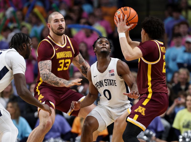 Jan 27, 2024; University Park, Pennsylvania, USA; Penn State Nittany Lions guard Kanye Clary (0) defends as Minnesota Golden Gophers guard Mike Mitchell Jr (2) holds the ball during the first half at Bryce Jordan Center. Minnesota defeated Penn State 83-74. Mandatory Credit: Matthew O'Haren-USA TODAY Sports