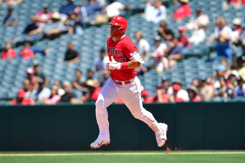 Jun 29, 2023; Anaheim, California, USA; Los Angeles Angels center fielder Mike Trout (27) reaches second on a double against the Chicago White Sox during the fourth inning at Angel Stadium. Mandatory Credit: Gary A. Vasquez-USA TODAY Sports