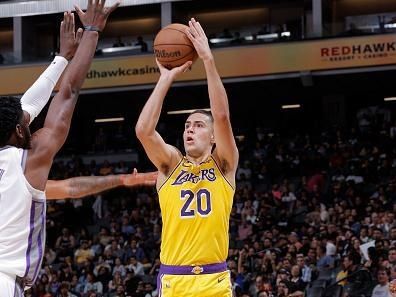 SACRAMENTO, CA - OCTOBER 14: Cole Swider #20 of the Los Angeles Lakers shoots a three point basket during the game against the Sacramento Kings on October 14, 2022 at Golden 1 Center in Sacramento, California. NOTE TO USER: User expressly acknowledges and agrees that, by downloading and or using this Photograph, user is consenting to the terms and conditions of the Getty Images License Agreement. Mandatory Copyright Notice: Copyright 2022 NBAE (Photo by Rocky Widner/NBAE via Getty Images)