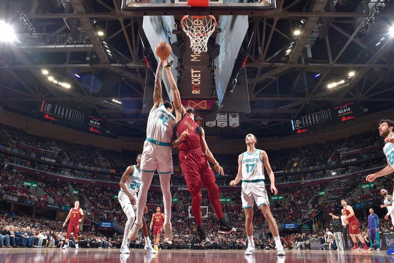 CLEVELAND, OH - MARCH 25: Jarrett Allen #31 of the Cleveland Cavaliers blocks a shot during the game against the Charlotte Hornets on March 25, 2024 at Rocket Mortgage FieldHouse in Cleveland, Ohio. NOTE TO USER: User expressly acknowledges and agrees that, by downloading and/or using this Photograph, user is consenting to the terms and conditions of the Getty Images License Agreement. Mandatory Copyright Notice: Copyright 2024 NBAE (Photo by David Liam Kyle/NBAE via Getty Images)