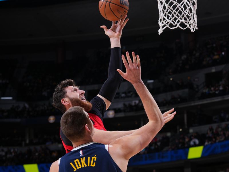 DENVER, CO - JANUARY 17: Jusuf Nurkic #27 of the Portland Trail Blazers drives to the basket during the game against the Denver Nuggets on January 17, 2023 at the Ball Arena in Denver, Colorado. NOTE TO USER: User expressly acknowledges and agrees that, by downloading and/or using this Photograph, user is consenting to the terms and conditions of the Getty Images License Agreement. Mandatory Copyright Notice: Copyright 2023 NBAE (Photo by Bart Young/NBAE via Getty Images)