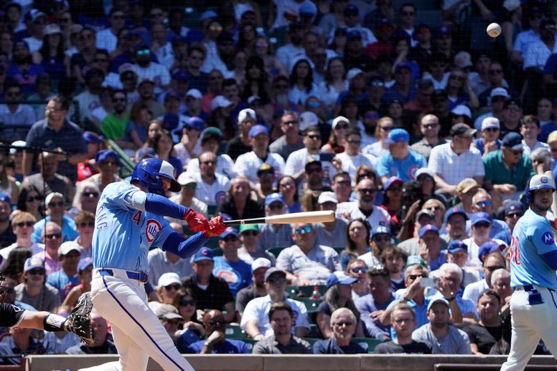 May 16, 2025; Chicago, Illinois, USA; Chicago Cubs outfielder Pete Crow-Armstrong (4) hits a three run home run against the Chicago White Sox during the second inning at Wrigley Field. Mandatory Credit: David Banks-Imagn Images