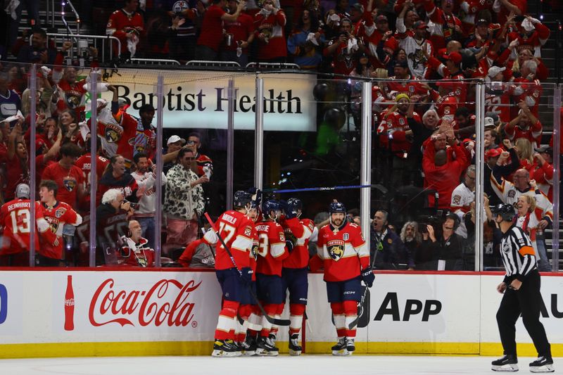 Jun 8, 2024; Sunrise, Florida, USA; Florida Panthers celebrate Florida Panthers forward Carter Verhaeghe (23) goal during the first period against the Edmonton Oilers in game one of the 2024 Stanley Cup Final at Amerant Bank Arena. Mandatory Credit: Sam Navarro-USA TODAY Sports