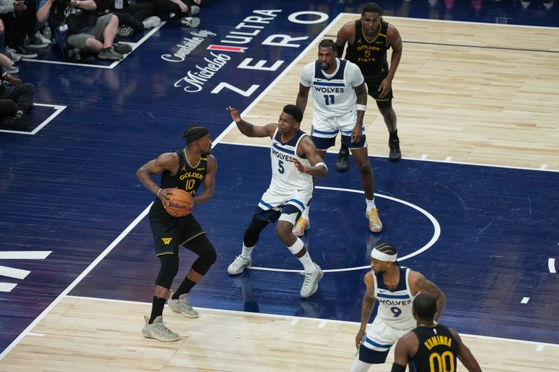 MINNEAPOLIS, MN -  MAY 6: Jimmy Butler #10 of the Golden State Warriors handles the ball during the game against the Minnesota Timberwolves during Game 1 of the 2025 NBA Western Conference Semifinals on May 6, 2025 at Target Center in Minneapolis, Minnesota. NOTE TO USER: User expressly acknowledges and agrees that, by downloading and or using this Photograph, user is consenting to the terms and conditions of the Getty Images License Agreement. Mandatory Copyright Notice: Copyright 2025 NBAE (Photo by Jordan Johnson/NBAE via Getty Images)