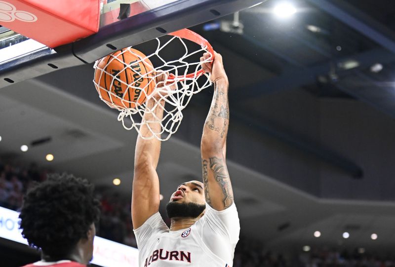 Feb 11, 2023; Auburn, Alabama, USA;  Alabama Crimson Tide forward Noah Gurley (4) dunks against the Auburn Tigers at Neville Arena. Mandatory Credit: Julie Bennett-USA TODAY Sports

