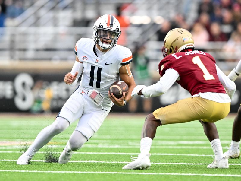 Sep 30, 2023; Chestnut Hill, Massachusetts, USA; Virginia Cavaliers quarterback Tony Muskett (11) runs with the ball against Boston College Eagles defensive back Elijah Jones (1) during the second half at Alumni Stadium. Mandatory Credit: Brian Fluharty-USA TODAY Sports