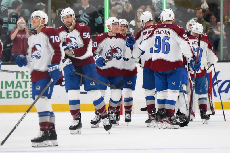 Nov 13, 2023; Seattle, Washington, USA; The Colorado Avalanche celebrate defeating the Seattle Kraken at Climate Pledge Arena. Mandatory Credit: Steven Bisig-USA TODAY Sports