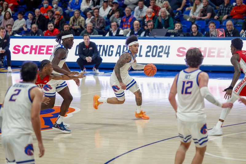 Jan 16, 2024; Boise, Idaho, USA; Boise State Broncos guard Roddie Anderson III (0) on a fast break during the second half against the UNLV Rebels at ExtraMile Arena. UNLV beats Boise State 68-64Mandatory Credit: Brian Losness-USA TODAY Sports