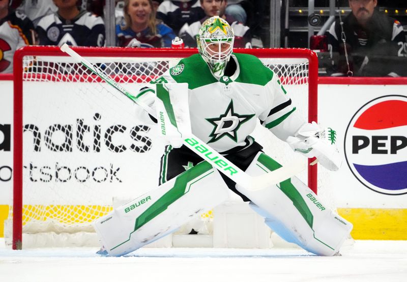 Apr 7, 2024; Denver, Colorado, USA; Dallas Stars goaltender Jake Oettinger (29) tracks a inbound puck in the first period against the Colorado Avalanche at Ball Arena. Mandatory Credit: Ron Chenoy-USA TODAY Sports