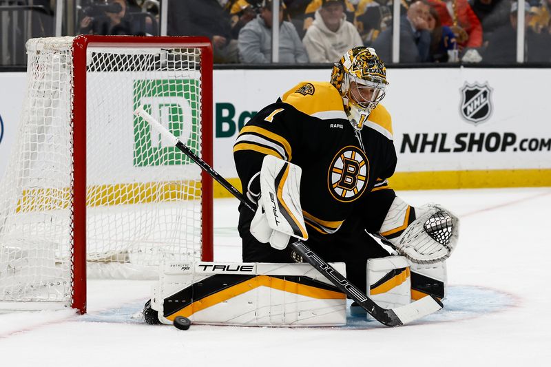 Oct 14, 2024; Boston, Massachusetts, USA; Boston Bruins goaltender Jeremy Swayman (1) makes a pad save against the Florida Panthers during the first period at TD Garden. Mandatory Credit: Winslow Townson-Imagn Images