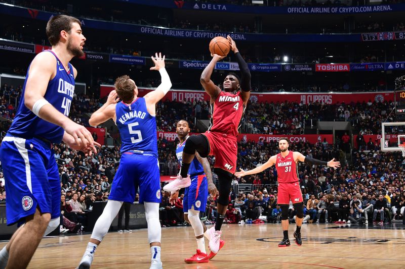 LOS ANGELES, CA - JANUARY 2: Victor Oladipo #4 of the Miami Heat shoots the ball during the game against the LA Clippers on January 2, 2023 at Crypto.Com Arena in Los Angeles, California. NOTE TO USER: User expressly acknowledges and agrees that, by downloading and/or using this Photograph, user is consenting to the terms and conditions of the Getty Images License Agreement. Mandatory Copyright Notice: Copyright 2023 NBAE (Photo by Adam Pantozzi/NBAE via Getty Images)