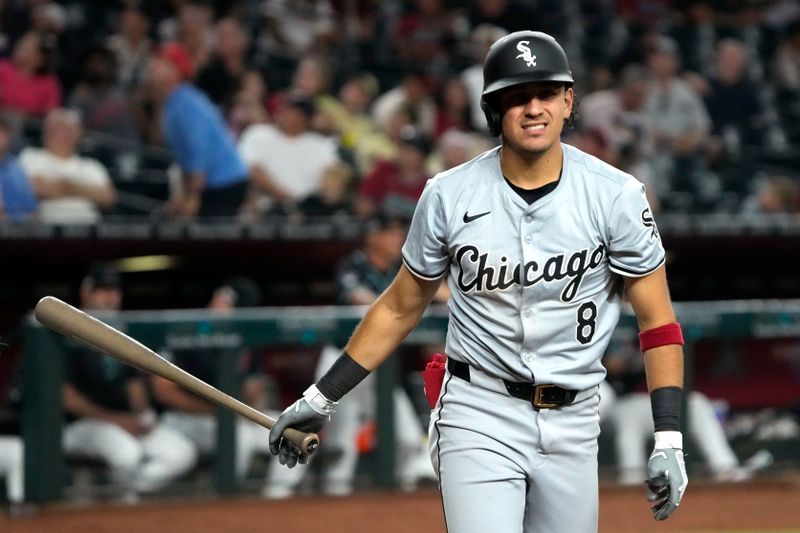 Jun 14, 2024; Phoenix, Arizona, USA; Chicago White Sox second base Nicky Lopez (8) reacts after striking out against the Arizona Diamondbacks in the fourth inning at Chase Field. Mandatory Credit: Rick Scuteri-USA TODAY Sports