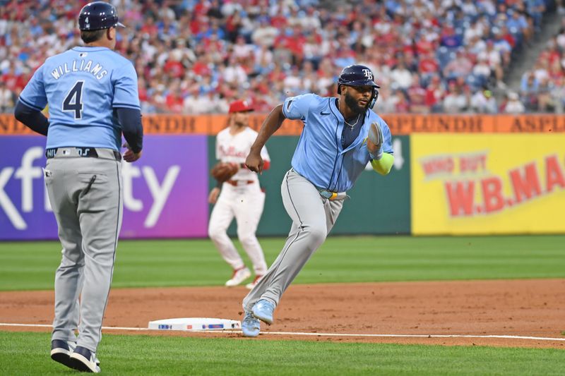 Sep 10, 2024; Philadelphia, Pennsylvania, USA; Tampa Bay Rays first base Jonathan Aranda (62) runs to home as he scores a run during the second inning against the Philadelphia Phillies at Citizens Bank Park. Mandatory Credit: Eric Hartline-Imagn Images