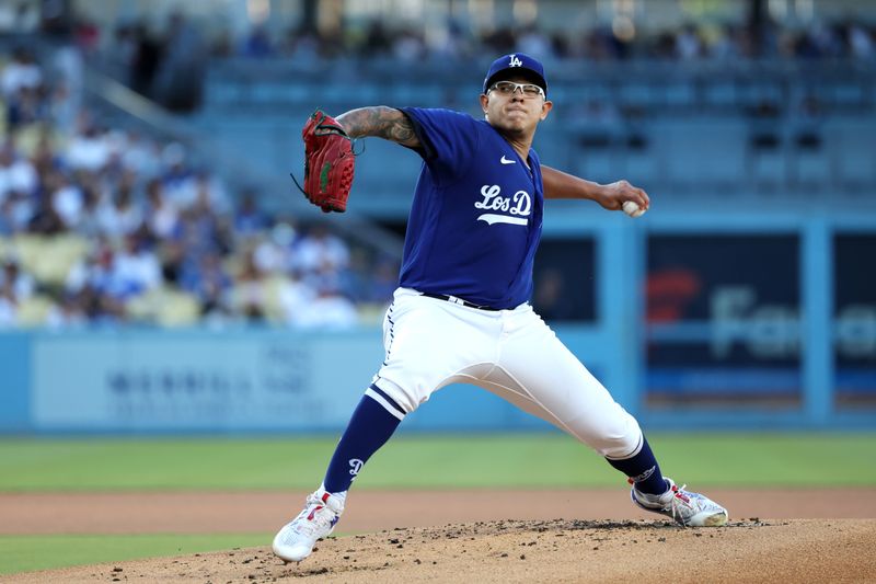 Aug 3, 2023; Los Angeles, California, USA;  Los Angeles Dodgers starting pitcher Julio Urias (7) pitches during the first inning against the Oakland Athletics at Dodger Stadium. Mandatory Credit: Kiyoshi Mio-USA TODAY Sports