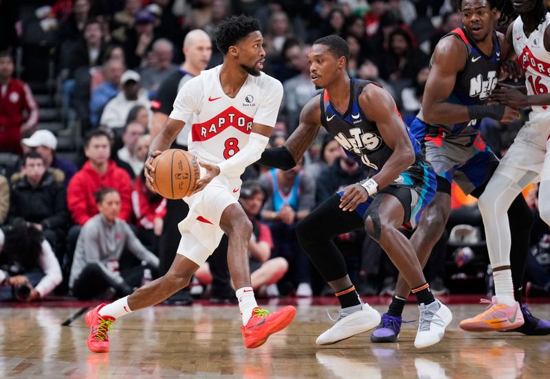 TORONTO, ON - MARCH 25: Kobi Simmons #8 of the Toronto Raptors dribbles against Lonnie Walker IV #8 of the Brooklyn Nets during the first half at the Scotiabank Arena on March 25, 2024 in Toronto, Ontario, Canada. NOTE TO USER: User expressly acknowledges and agrees that, by downloading and/or using this Photograph, user is consenting to the terms and conditions of the Getty Images License Agreement. (Photo by Mark Blinch/Getty Images)