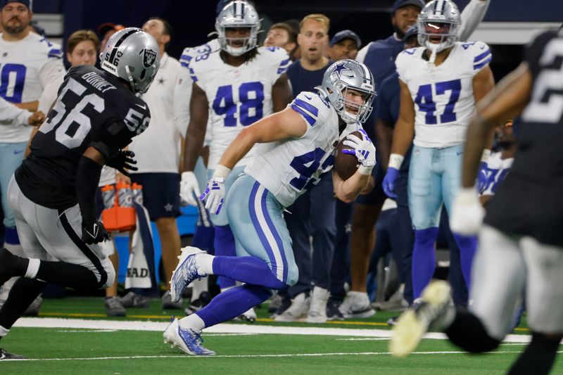 Dallas Cowboys running back Hunter Luepke (43) runs against the Las Vegas Raiders during a preseason NFL Football game in Arlington, Texas, Saturday, Aug. 26, 2023. (AP Photo/Michael Ainsworth)