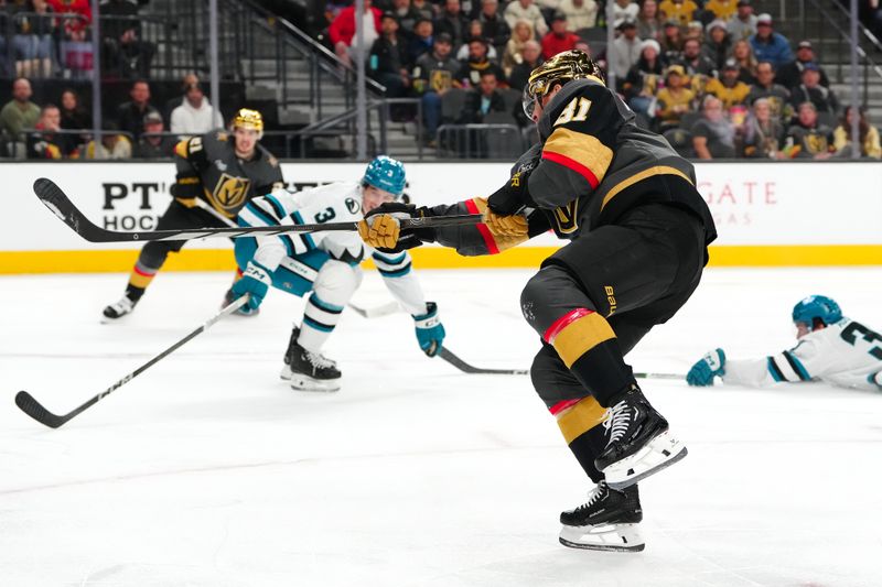 Dec 10, 2023; Las Vegas, Nevada, USA; Vegas Golden Knights right wing Jonathan Marchessault (81) scores a goal against the San Jose Sharks during the second period at T-Mobile Arena. Mandatory Credit: Stephen R. Sylvanie-USA TODAY Sports