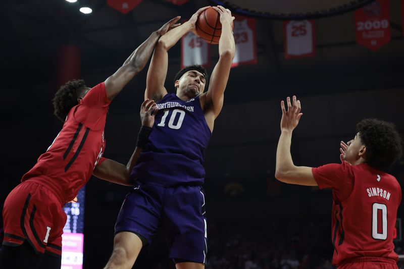 Mar 5, 2023; Piscataway, New Jersey, USA; Northwestern Wildcats forward Tydus Verhoeven (10) rebounds against Rutgers Scarlet Knights forward Antwone Woolfolk (13) and guard Derek Simpson (0) during the first half at Jersey Mike's Arena. Mandatory Credit: Vincent Carchietta-USA TODAY Sports