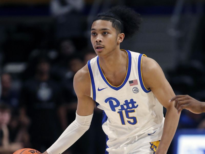 Dec 20, 2023; Pittsburgh, Pennsylvania, USA; Pittsburgh Panthers guard Jaland Lowe (15) dribbles the ball against the IPFW Mastodons during the second half at the Petersen Events Center. Pittsburgh won 62-48. Mandatory Credit: Charles LeClaire-USA TODAY Sports