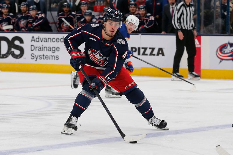 Mar 7, 2024; Columbus, Ohio, USA; Columbus Blue Jackets Forward Cole Sillinger (4) looks to pass against the Edmonton Oilers during the first period at Nationwide Arena. Mandatory Credit: Russell LaBounty-USA TODAY Sports