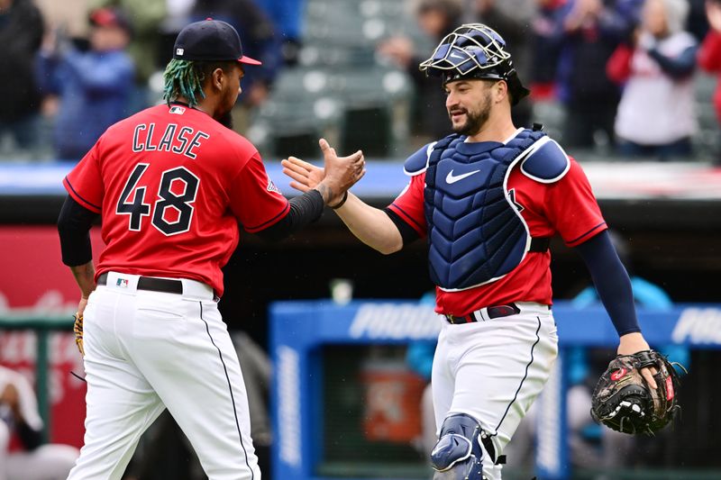 Apr 23, 2023; Cleveland, Ohio, USA; Cleveland Guardians relief pitcher Emmanuel Clase (48) celebrates with catcher Mike Zunino (10) after the Guardians beat the Miami Marlins at Progressive Field. Mandatory Credit: Ken Blaze-USA TODAY Sports