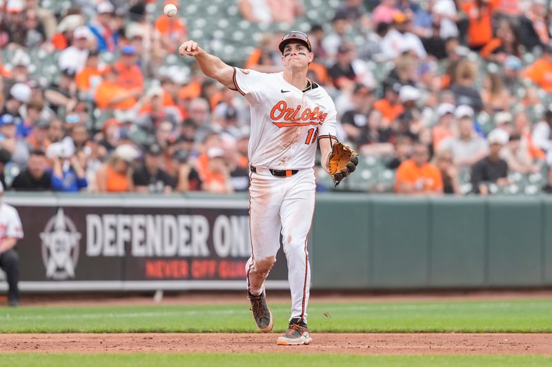 May 4, 2025; Baltimore, Maryland, USA; Baltimore Orioles third baseman Coby Mayo (16) throws out Kansas City Royals right fielder Hunter Renfroe (16) (not pictured) after fielding a ground ball during the eighth inning at Oriole Park at Camden Yards. Mandatory Credit: Gregory Fisher-Imagn Images