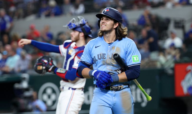 Sep 18, 2024; Arlington, Texas, USA;  Toronto Blue Jays third baseman Addison Barger (47) reacts after striking out during the fifth inning against the Texas Rangers at Globe Life Field. Mandatory Credit: Kevin Jairaj-Imagn Images