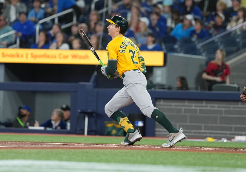 May 31, 2025; Toronto, Ontario, CAN; Athletics first baseman Tyler Soderstrom (21) reacts after hitting a three run home run against the Toronto Blue Jays during the first inning at Rogers Centre. Mandatory Credit: Nick Turchiaro-Imagn Images