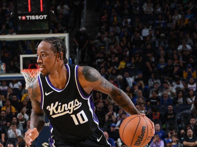 SAN FRANCISCO, CA - OCTOBER 11: DeMar DeRozan #10 of the Sacramento Kings handles the ball during the game against the Golden State Warriors during a NBA Preseason game on October 11, 2024 at Chase Center in San Francisco, California. NOTE TO USER: User expressly acknowledges and agrees that, by downloading and or using this photograph, user is consenting to the terms and conditions of Getty Images License Agreement. Mandatory Copyright Notice: Copyright 2024 NBAE (Photo by Noah Graham/NBAE via Getty Images)