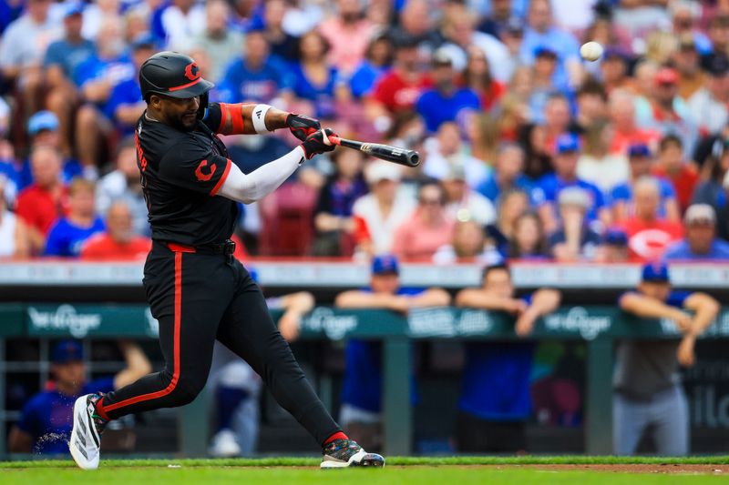 Sep 19, 2025; Cincinnati, Ohio, USA; Cincinnati Reds designated hitter Miguel Andujar (38) hits a solo home run in the first inning against the Chicago Cubs at Great American Ball Park. Mandatory Credit: Katie Stratman-Imagn Images