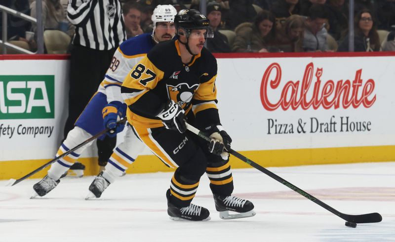 Nov 26, 2025; Pittsburgh, Pennsylvania, USA; Pittsburgh Penguins center Sidney Crosby (87) skates with the puck against the Buffalo Sabres during the third period at PPG Paints Arena. Mandatory Credit: Charles LeClaire-Imagn Images