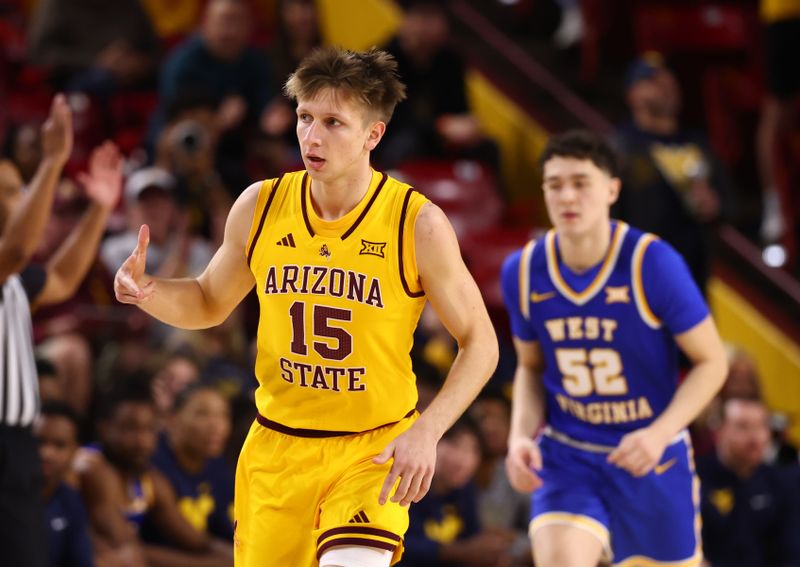 Jan 21, 2026; Tempe, Arizona, USA; Arizona State Sun Devils guard Noah Meeusen (15) celebrates a three point shot against the West Virginia Mountaineers in the first half at Desert Financial Arena. Mandatory Credit: Mark J. Rebilas-Imagn Images