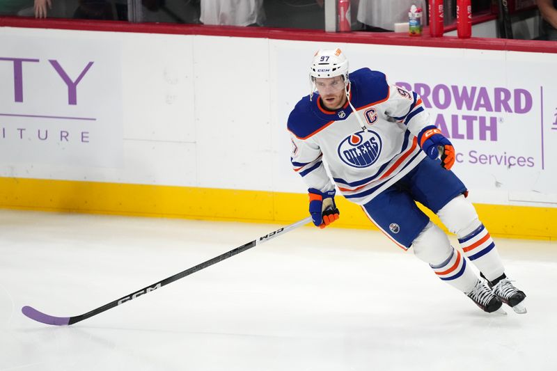Nov 20, 2023; Sunrise, Florida, USA; Edmonton Oilers center Connor McDavid (97) warms up prior to the game against the Florida Panthers at Amerant Bank Arena. Mandatory Credit: Jasen Vinlove-USA TODAY Sports
