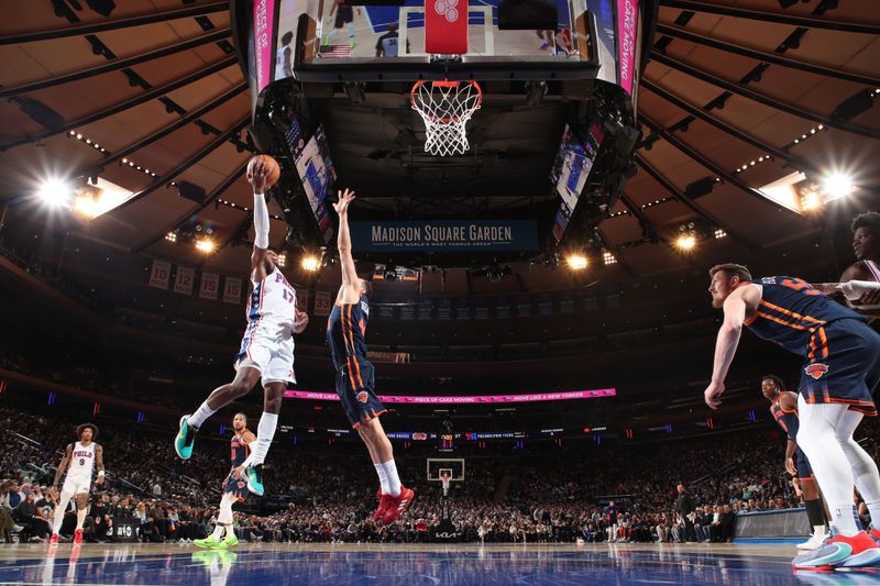 NEW YORK, NY - MARCH 12:  Buddy Heild #17 of the Philadelphia 76ers drives to the basket during the game against the New York Knicks on March 12, 2024 at Madison Square Garden in New York City, New York.  NOTE TO USER: User expressly acknowledges and agrees that, by downloading and or using this photograph, User is consenting to the terms and conditions of the Getty Images License Agreement. Mandatory Copyright Notice: Copyright 2024 NBAE  (Photo by Nathaniel S. Butler/NBAE via Getty Images)