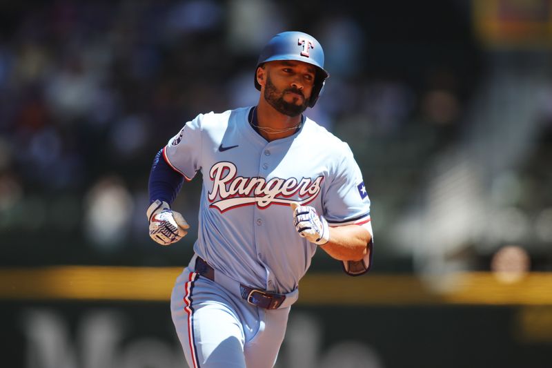 Sep 8, 2024; Arlington, Texas, USA; Texas Rangers second base Marcus Semien (2) rounds the bases after hitting a lead off home run against the Los Angeles Angels in the first inning at Globe Life Field. Mandatory Credit: Tim Heitman-Imagn Images