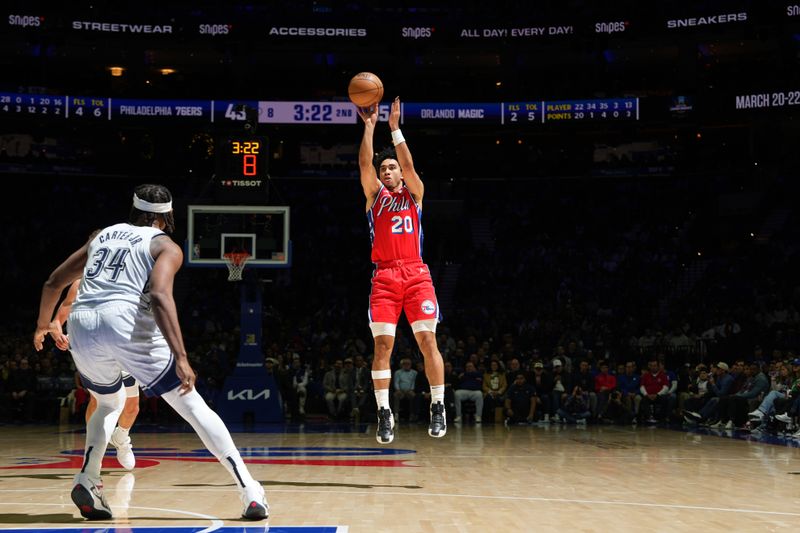 PHILADELPHIA, PA - DECEMBER 6: Jared McCain #20 of the Philadelphia 76ers shoots the ball during the game against the Orlando Magic  on December 6, 2024 at the Wells Fargo Center in Philadelphia, Pennsylvania NOTE TO USER: User expressly acknowledges and agrees that, by downloading and/or using this Photograph, user is consenting to the terms and conditions of the Getty Images License Agreement. Mandatory Copyright Notice: Copyright 2024 NBAE (Photo by Jesse D. Garrabrant/NBAE via Getty Images)