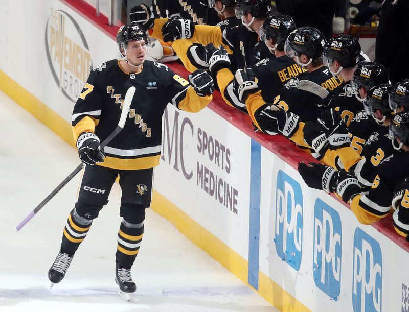 Nov 19, 2024; Pittsburgh, Pennsylvania, USA;  Pittsburgh Penguins right wing Rickard Rakell (67) celebrates his goal with the Penguins bench against the Tampa Bay Lightning during the second period at PPG Paints Arena. Mandatory Credit: Charles LeClaire-Imagn Images