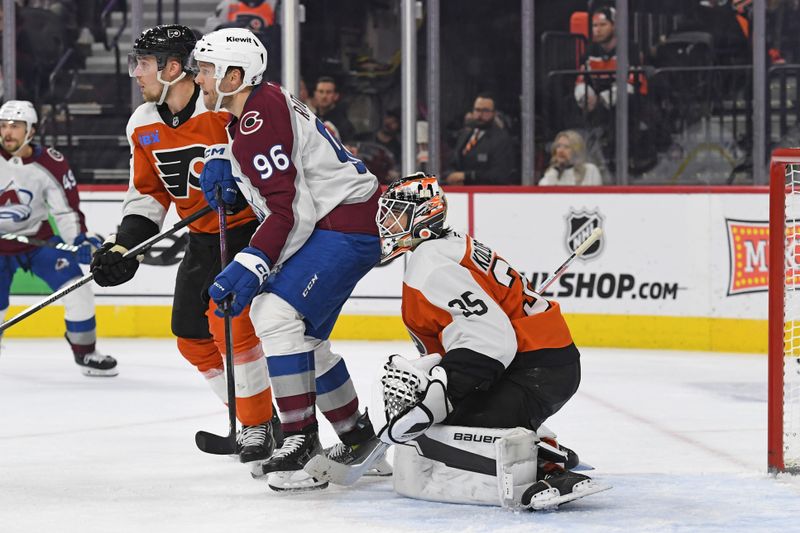 Nov 18, 2024; Philadelphia, Pennsylvania, USA; Colorado Avalanche right wing Mikko Rantanen (96) screens Philadelphia Flyers goaltender Aleksei Kolosov (35) during the second period at Wells Fargo Center. Mandatory Credit: Eric Hartline-Imagn Images