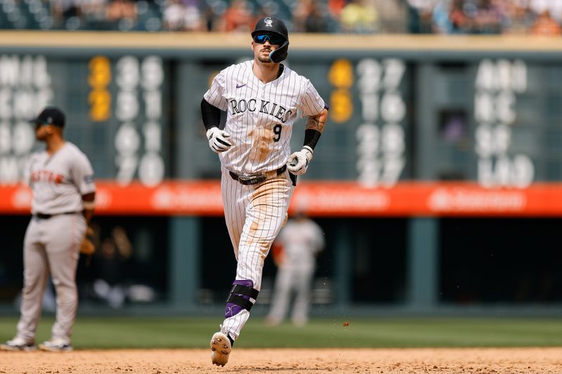 Jul 24, 2024; Denver, Colorado, USA; Colorado Rockies center fielder Brenton Doyle (9) rounds the bases on a grand slam in the sixth inning against the Boston Red Sox at Coors Field. Mandatory Credit: Isaiah J. Downing-USA TODAY Sports