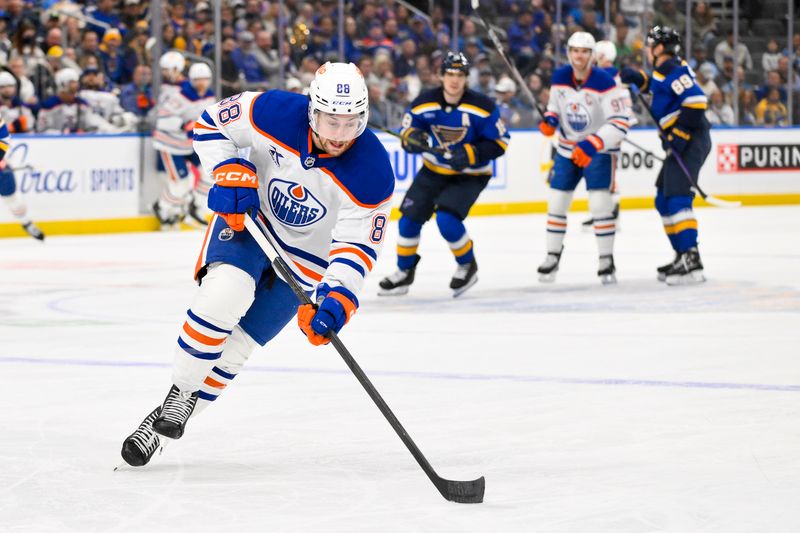Nov 3, 2025; St. Louis, Missouri, USA; Edmonton Oilers left wing Andrew Mangiapane (88) controls the puck against the St. Louis Blues during the third period at Enterprise Center. Mandatory Credit: Jeff Curry-Imagn Images