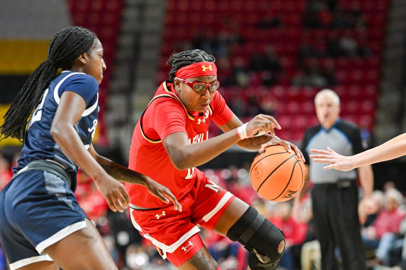 Feb 18, 2024; College Park, Maryland, USA;  Maryland Terrapins guard Shyanne Sellers (0) makes a move to the basket on Penn State Nittany Lions guard Jayla Oden (12) during the second  half at Xfinity Center. Mandatory Credit: Tommy Gilligan-USA TODAY Sports