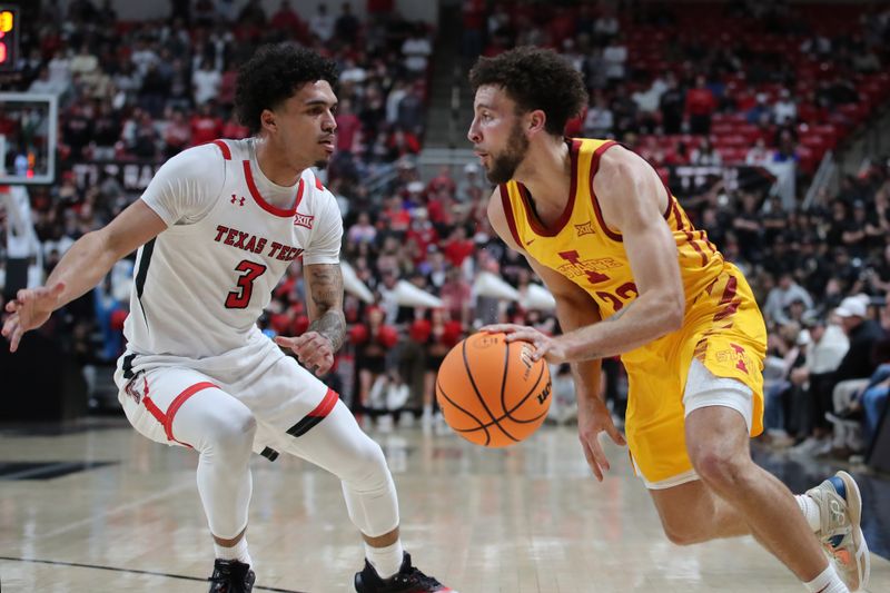 Jan 30, 2023; Lubbock, Texas, USA;  Iowa State Cyclones guard Gabe Klscheur (22) drives to the lane against Texas Tech Red Raiders guard D   Maurian Williams (3) in the first half at United Supermarkets Arena. Mandatory Credit: Michael C. Johnson-USA TODAY Sports